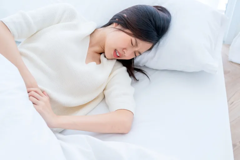 asian-woman-with-menstrual-problems-young-woman-with-stomach