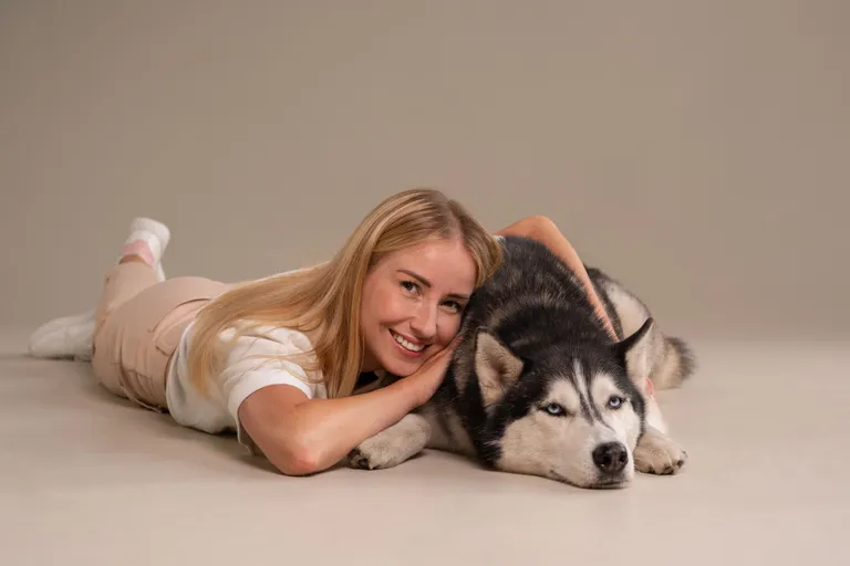 full-shot-woman-with-dog-studio