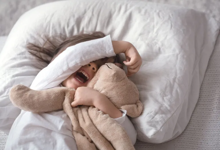 little-girl-bed-with-toy
