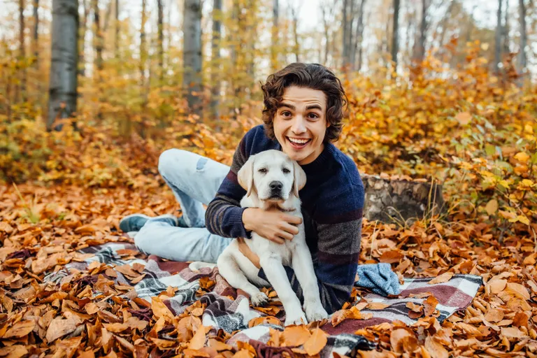 photo-handsome-man-his-dog-spend-time-autumn-forest.jpg