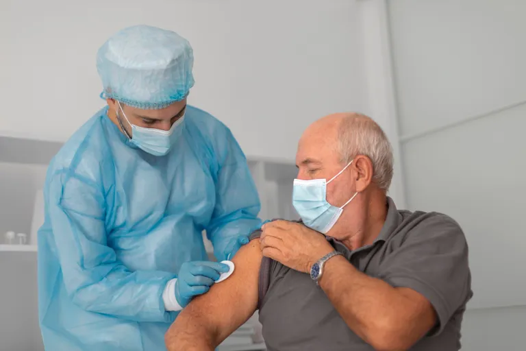 senior-male-patient-getting-vaccinated