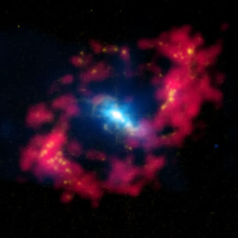 ภาพถ่ายกาแล็กซี NGC 4151 ในย่านคลื่นแสงต่าง ๆ สีฟ้าคือย่านคลื่นรังสีเอ็กซ์ สีขาวคือภาพจากย่านแสงที่ตามองเห็น และสีแดงคือย่านคลื่นในช่วงรังสีอินฟราเรด
