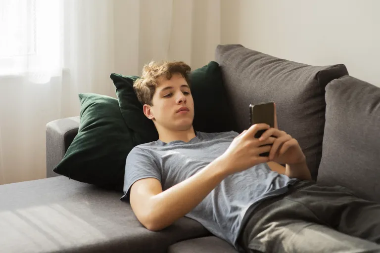 boy-checking-his-phone