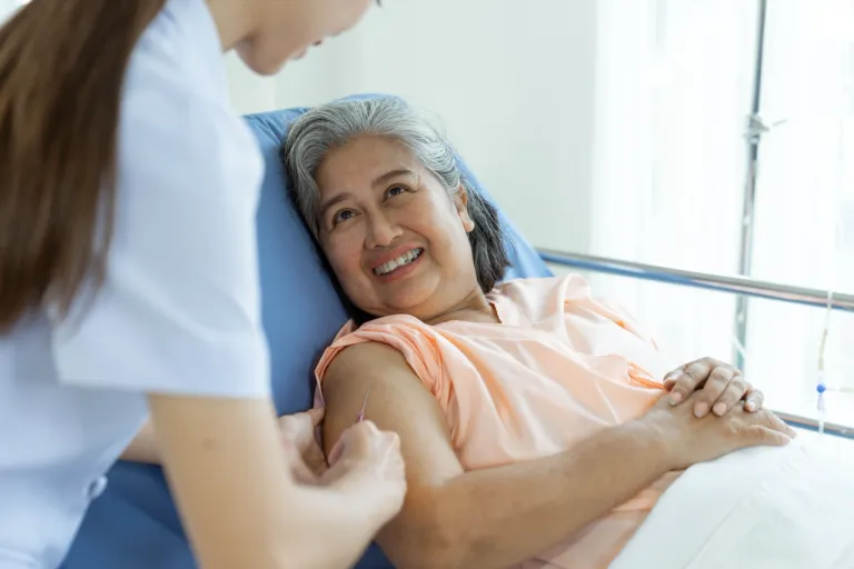 hand-s-nurse-holding-pill-injecting-elderly-female-patients
