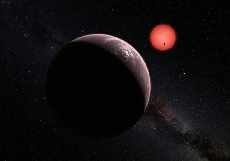 ภาพวาดจำลองของระบบ TRAPPIST-1 ที่ใช้ภาพถ่ายนี้เป็นข้อมูลในการตรวจพบดาวเคราะห์น้อยที่เล็กที่สุดในแถบดาวเคราะห์น้อย