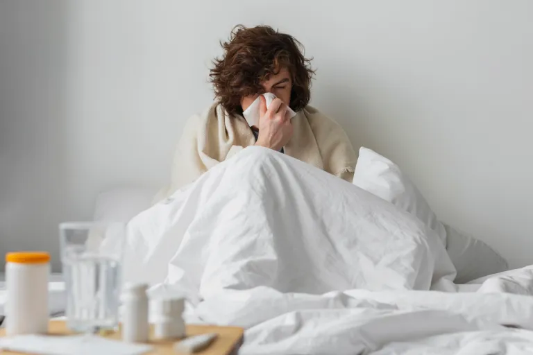 young-sick-man-staying-his-bed