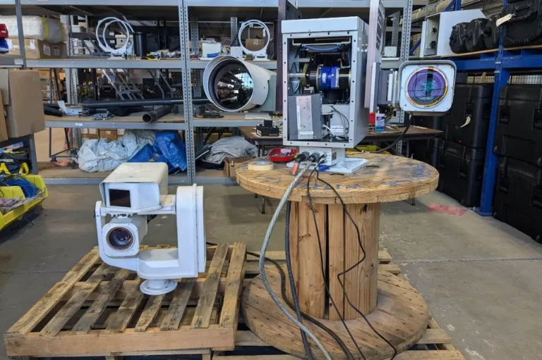 Two older-model camera displays that were once used to monitor the skies over the National Capital Region are on display in a warehouse at Joint Base Anacostia-Bolling in Washington Sept. 12 2024. ภาพจาก Katie Lange, DOD