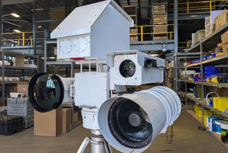 An Enhanced Regional Situational Awareness system camera part of the integrated air defense system that monitors the skies over the National Capital Region is set up for a demonstration at a warehouse at Joi ภาพจาก Katie Lange, DOD