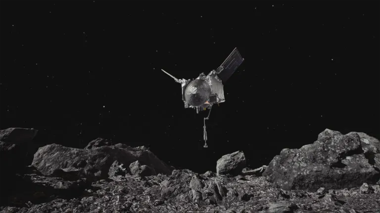 ภาพวาดของยาน OSIRIS REX ขณะกำลังเก็บตัวอย่างจากดาวเคราะห์น้อยเบนนู ภาพจาก NASA