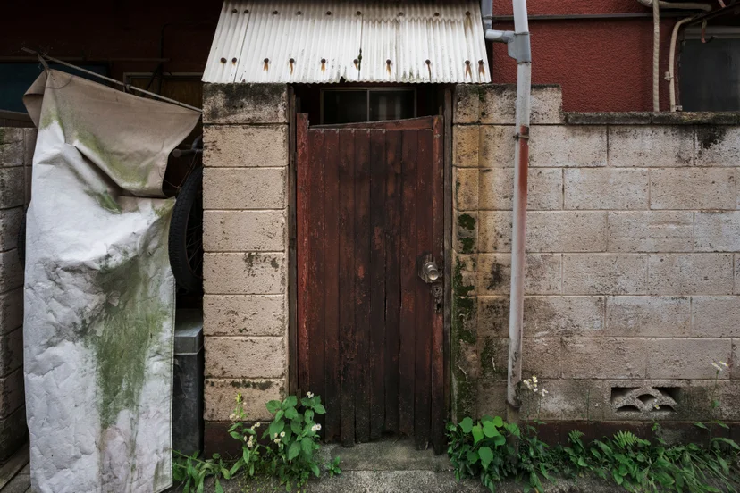 old-abandoned-house-with-rotted-door