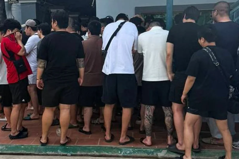 South Koreans and other nationals suspected of being involved in online scams during an arrest in Phnom Penh in October 2025 (Photo: Handout/Agence Kampuchea Press (AKP)/AFP)