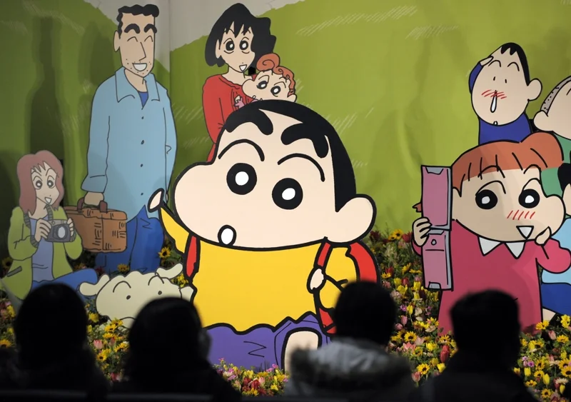 แฟนคลับ Crayon Shin-chan ในงานรำลึก Yoshito Usui ผู้สร้างสรรค์ผลงานที่เสียชีวิตในปี 2009 (ภาพจาก: Toshifumi Kitamura/AFP)