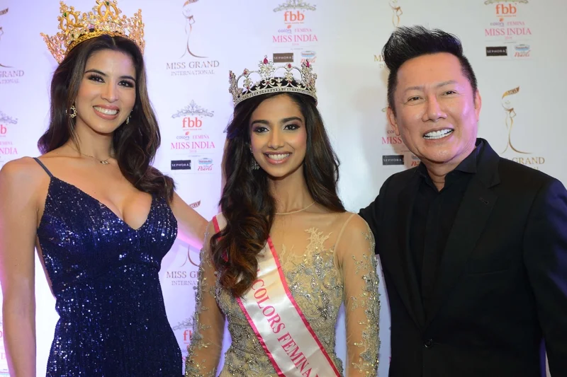 Nawat Itsargrisil (R), the president of Miss Grand International, pictured with Miss Grand International 2017 winner Mar&iacute;a Jose Lora (L) and Femina Miss India Grand International 2018 titleholder Meenakshi Chaudhary in 2018 (Photo: Narinder Nanu/AFP)