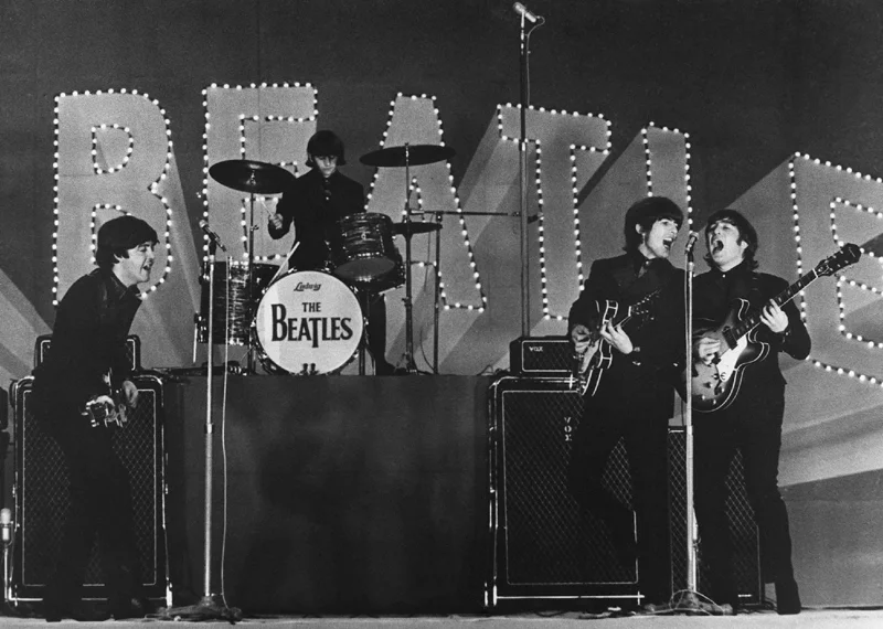 การแสดงดนตรีของสี่เต่าทองในกรุงโตเกียว เมื่อปี 1966 (ภาพ: Jiji Press/AFP)